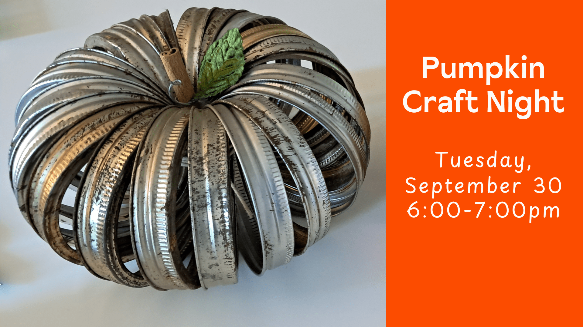 Pumpkin made out of mason canning jar lids with the lettering "Pumpkin Craft night"